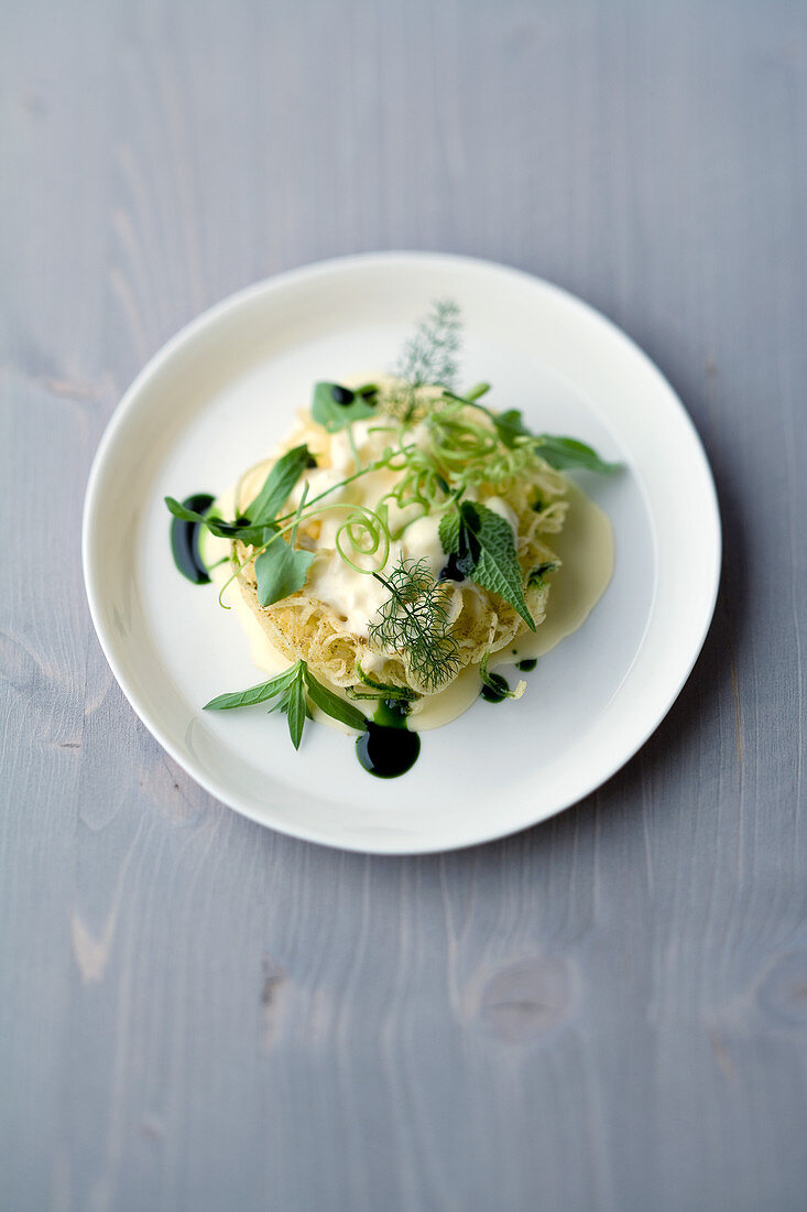 Sesame rosti with saint félicien, mace and wild herbs