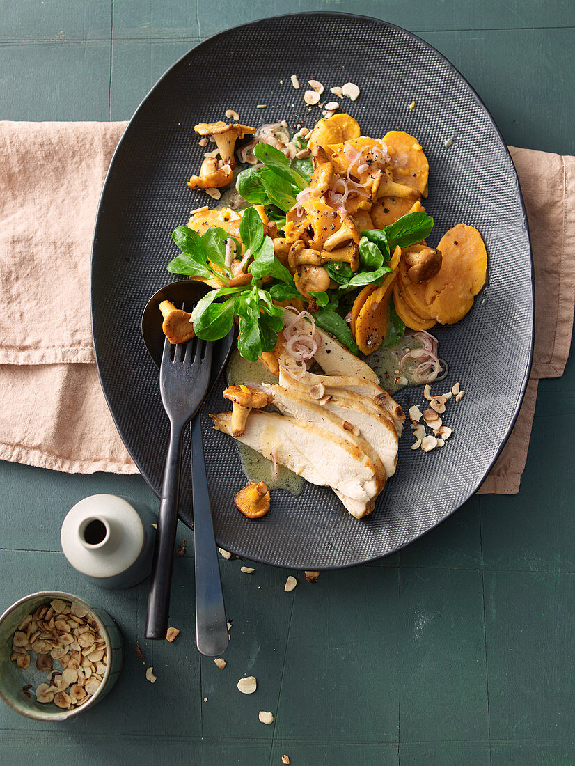 Sweet potato and chanterelle salad with chicken breast