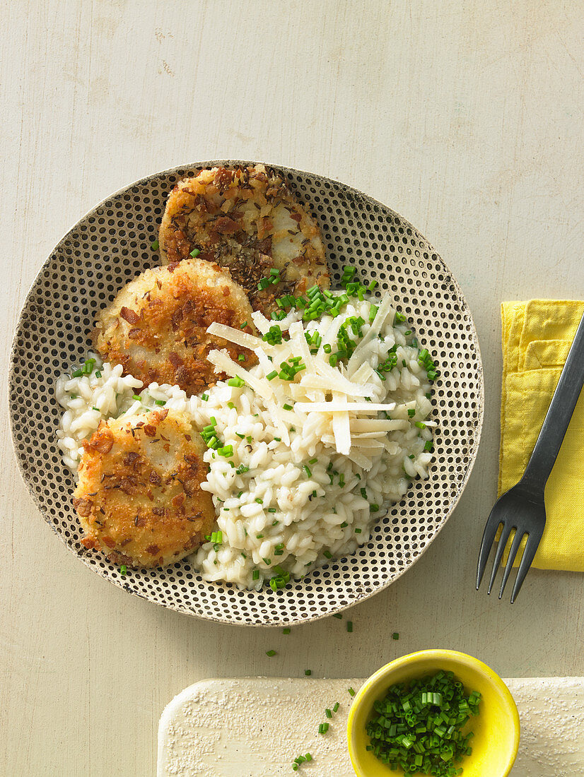 Celeriac escalope with a pretzel crumb crust with chive risotto