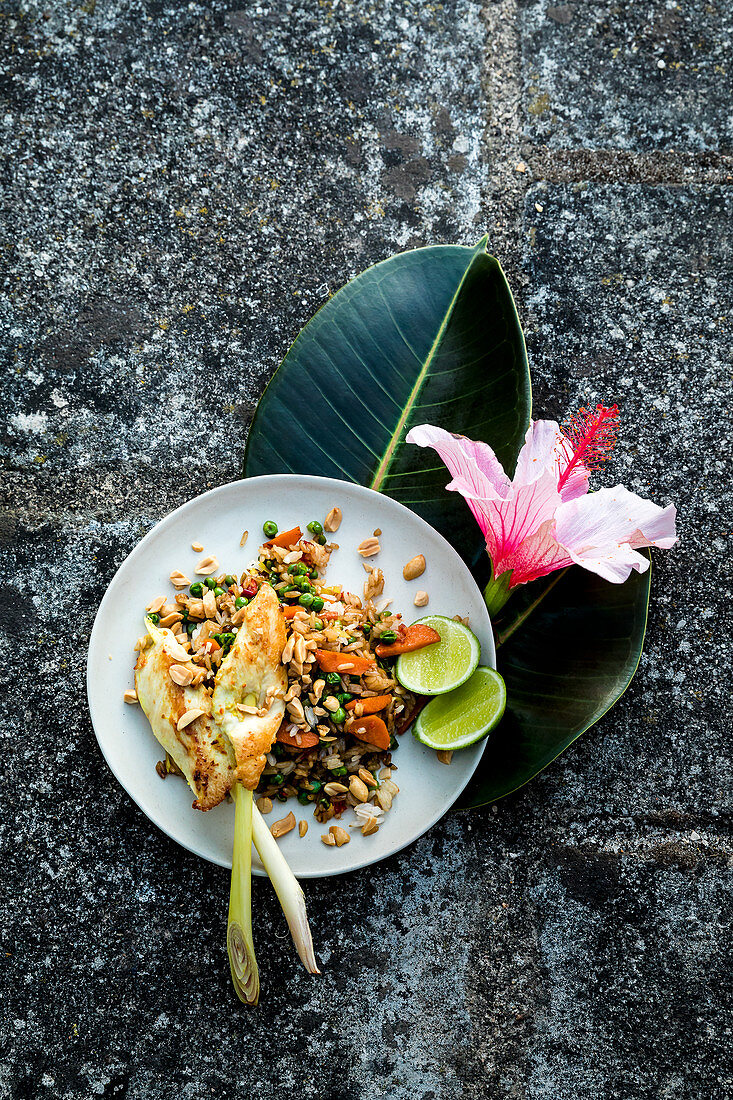 Nasi goreng with chicken satay and peanuts