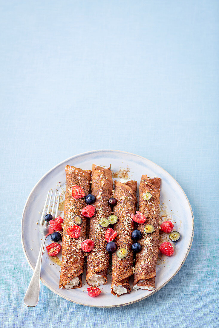 Chocolate pancakes with ricotta and tahini