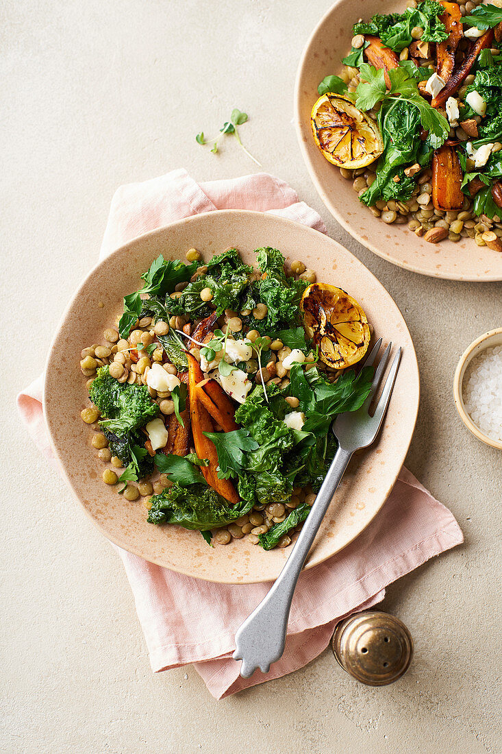 Vegetarian lunch, lentil salad with honey-roasted carrots, kale and goat cheese