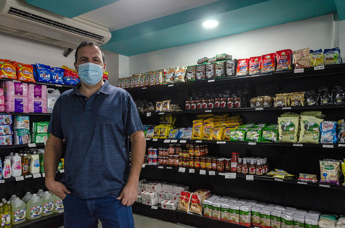 Shop worker wearing face mask