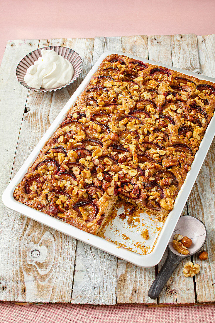 Plum cake with nuts, sliced
