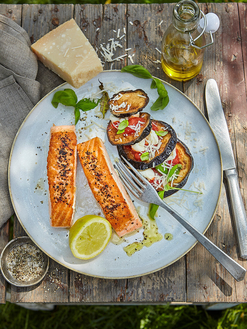 Grilled salmon with eggplant and roasted tomatoes