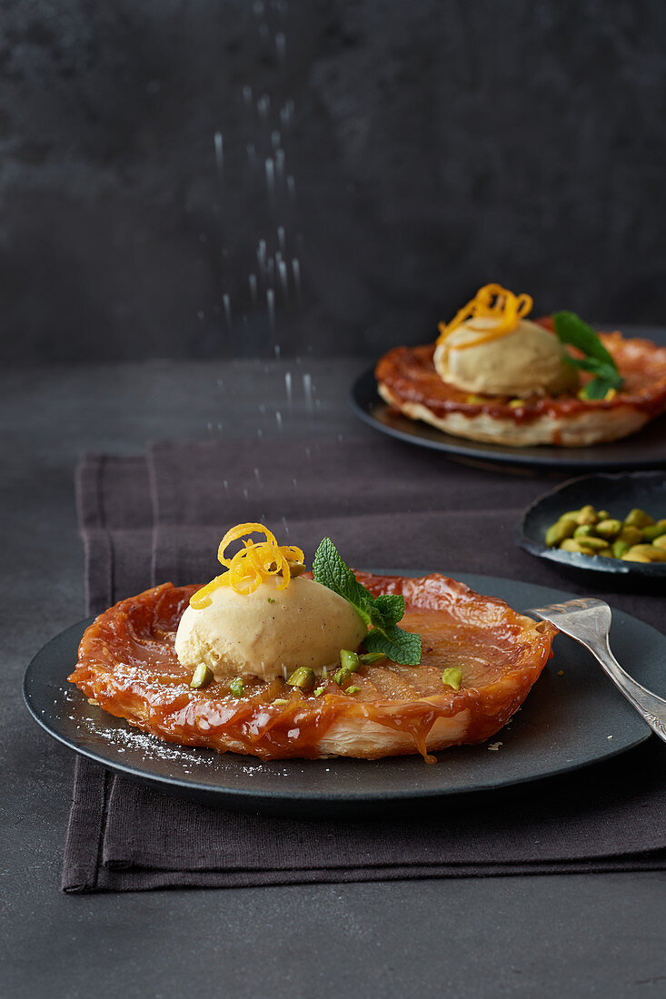 Tarte tatin with Grand Marnier ice cream and pistachios