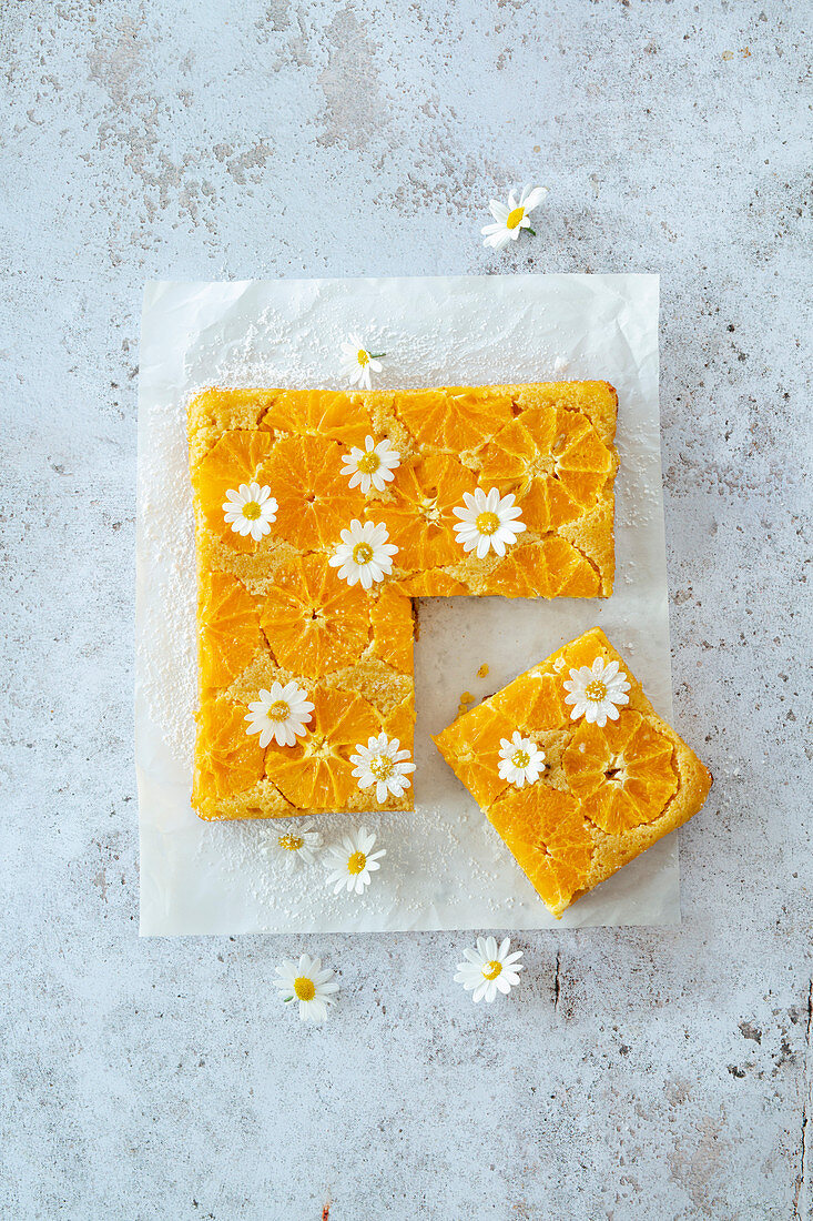 Vegan upside down orange cake with daisies