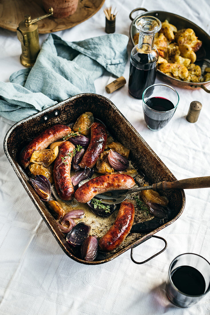 Baked Pork Sausages with Red Onion and Apples