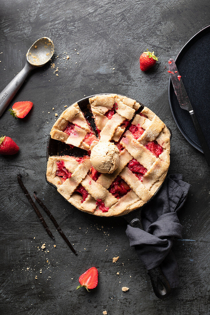 Strawberry and rhubarb tart served with peanut butter ice cream