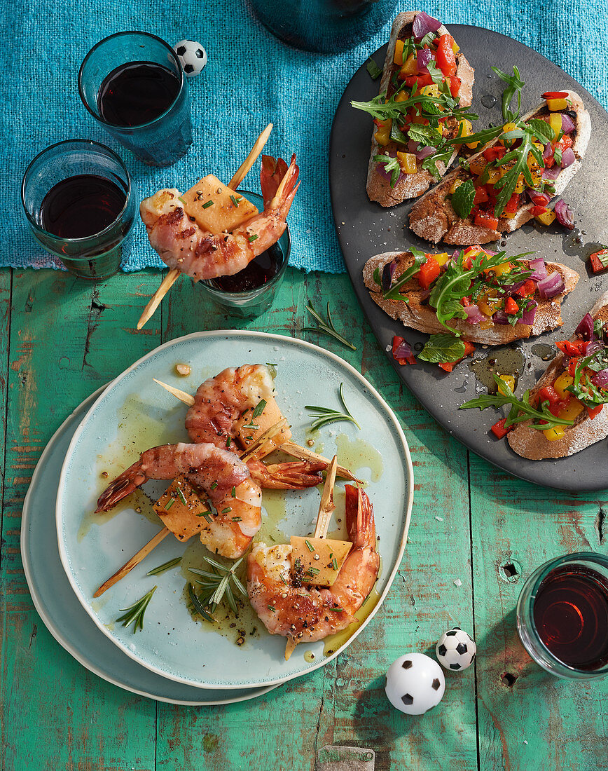 Prawns wrapped in bacon with bruscetta