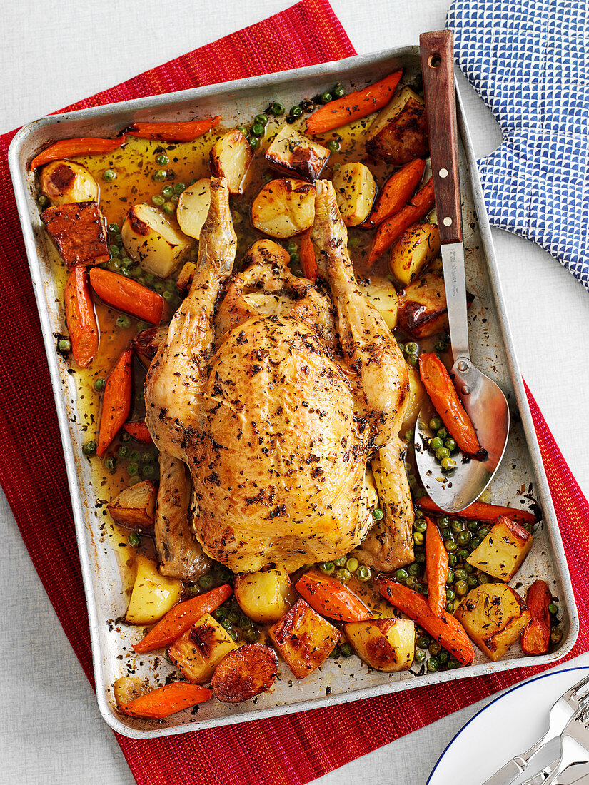 Whole pan fried chicken with vegetables