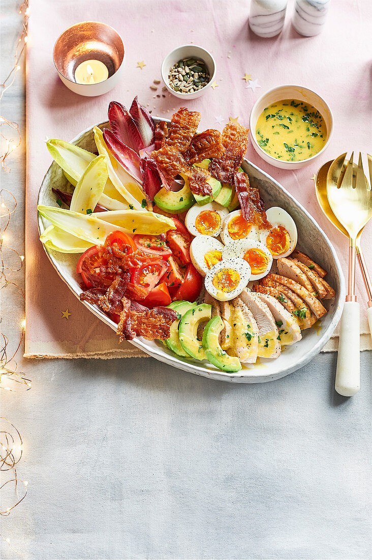 Turkey cobb salad with crispy bacon and eggs