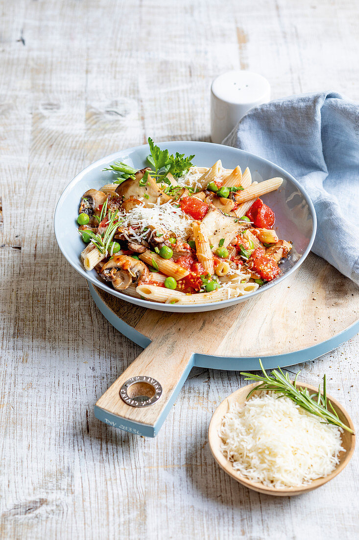 Penne with a mushroom and tomato ragout