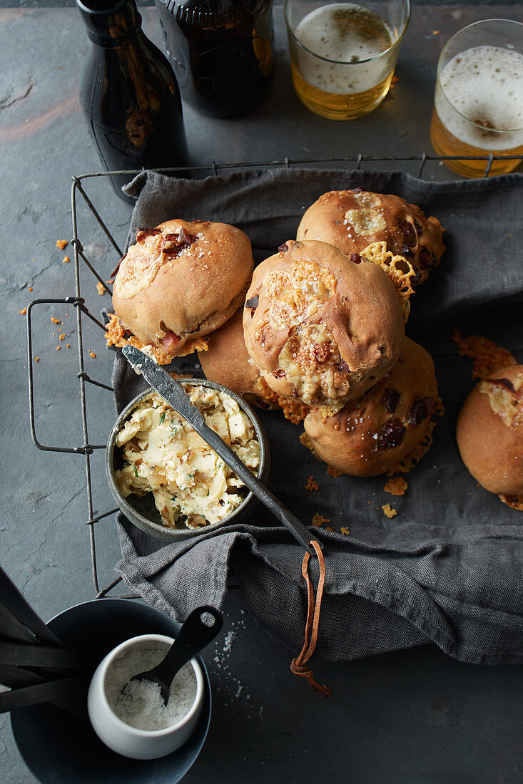 Beer rolls with bacon, alpine cheese and onion and garlic butter