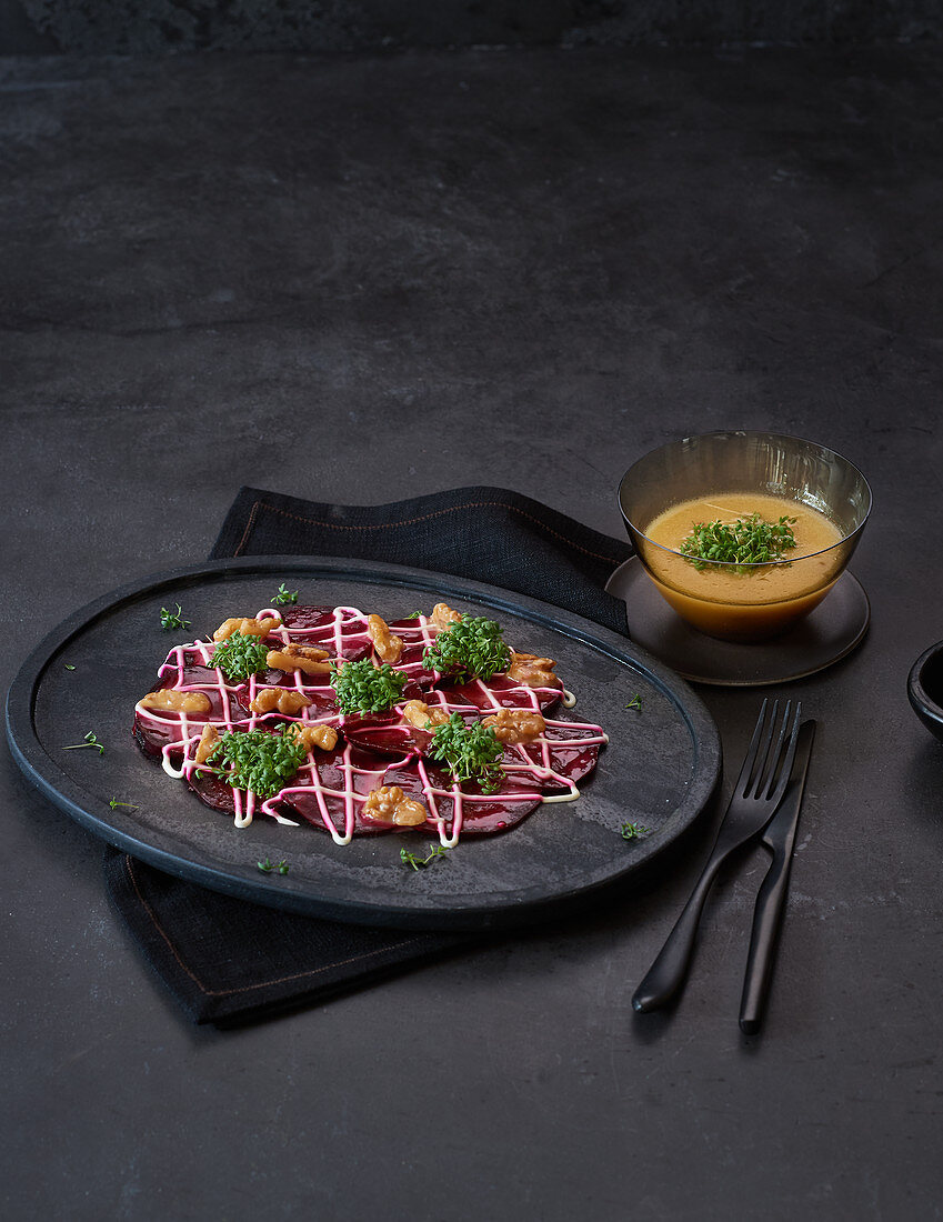 Beetroot carpaccio with walnut vinaigrette and sour cream