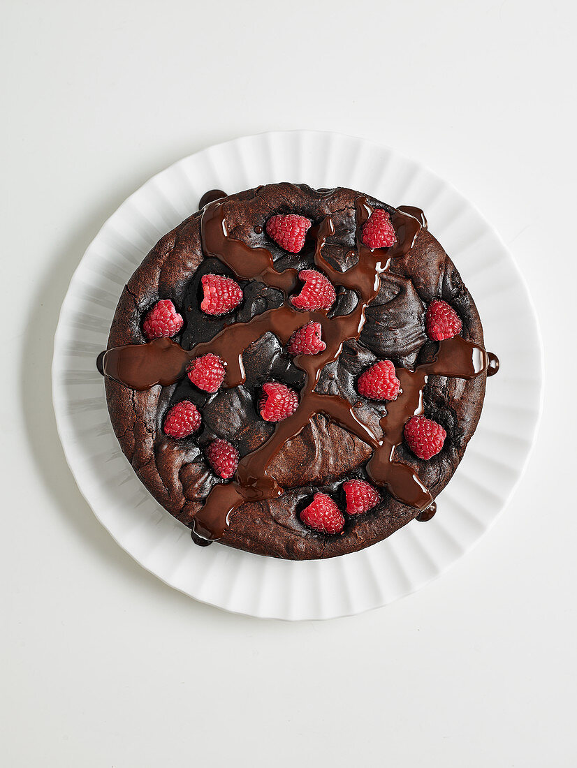 Chocolate brownie cake with raspberries