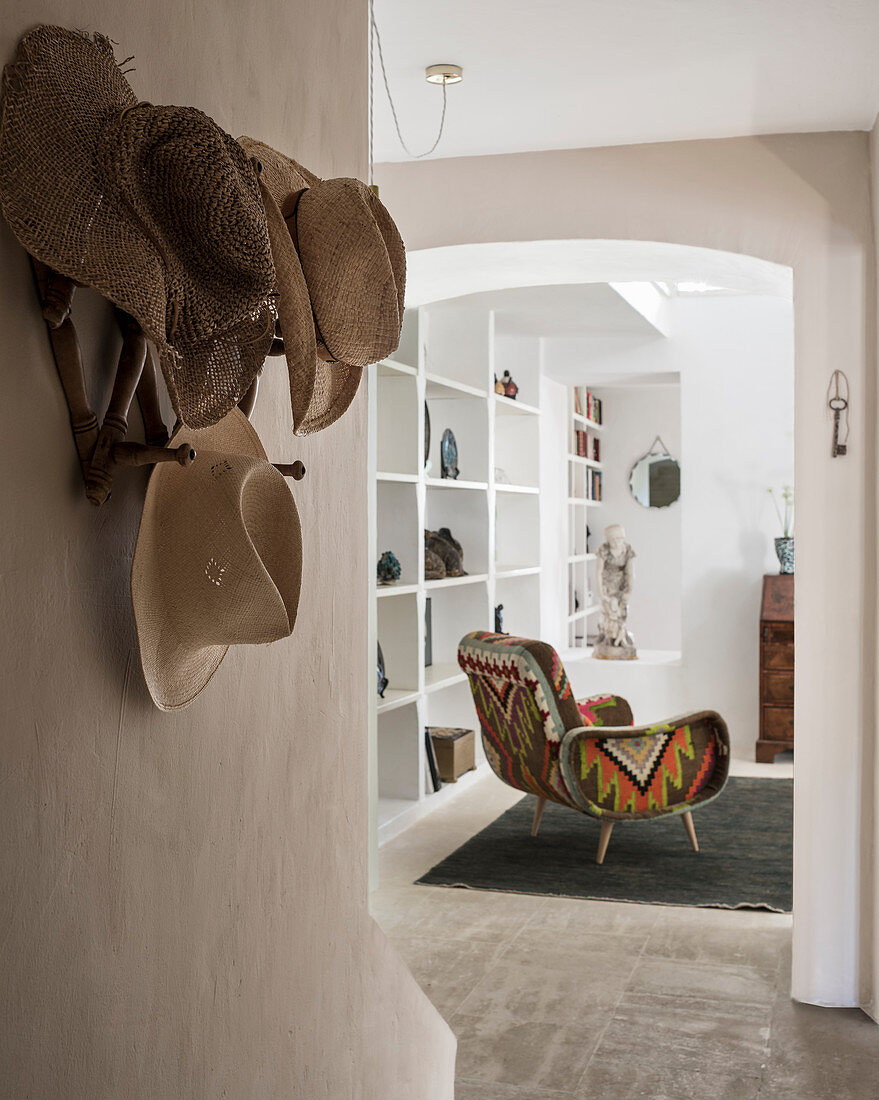 Upholstered armchair and sunhats farmhouse