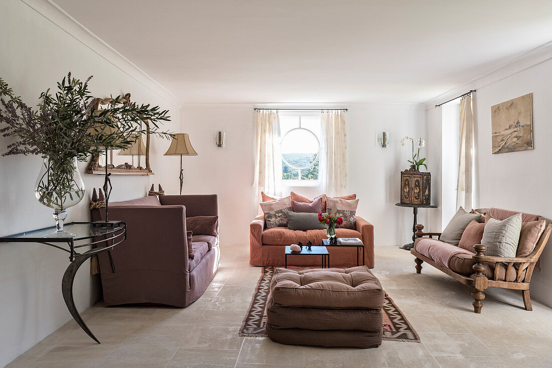 Pastel furniture in living room of farmhouse