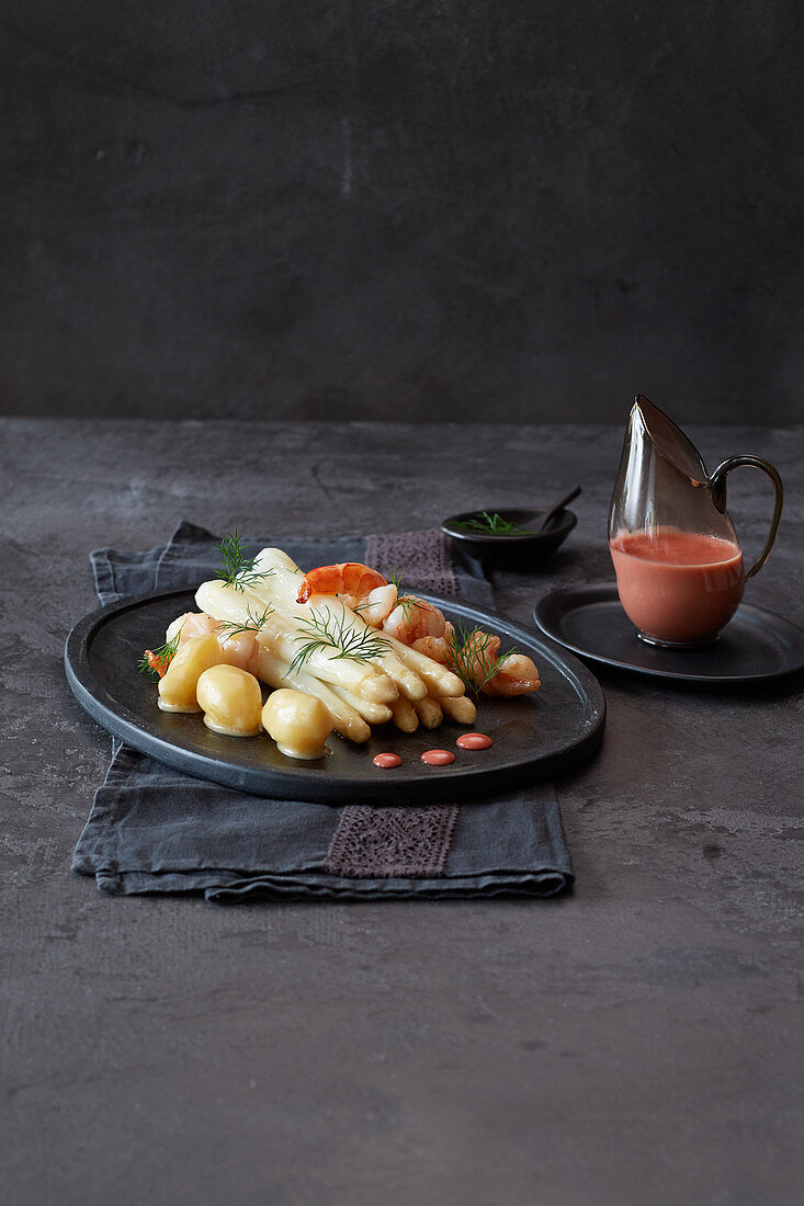 White asparagus with Maltaise sauce and king prawns