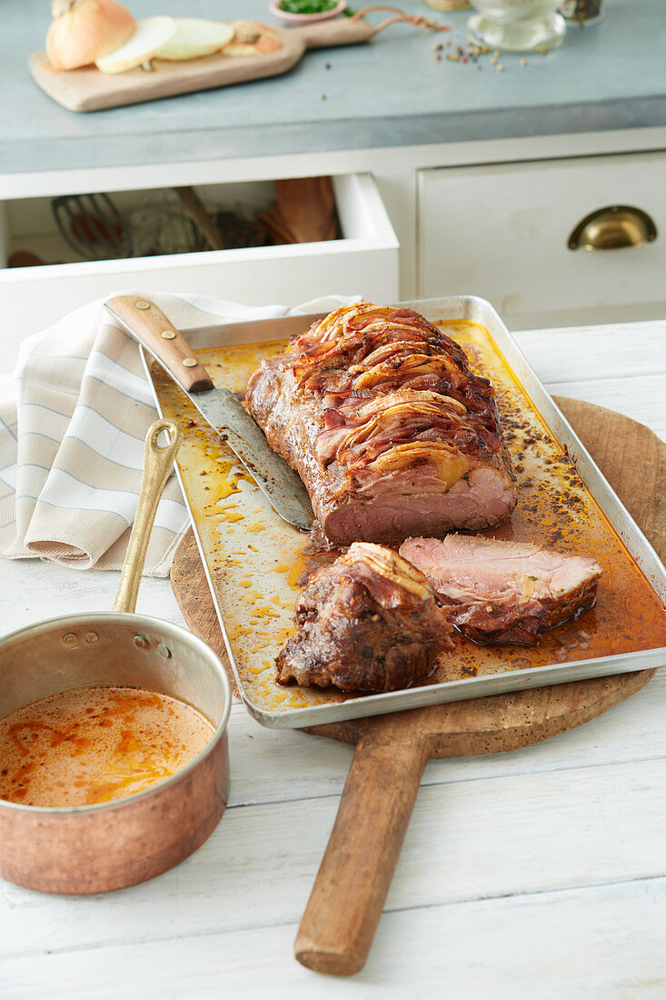 Studded roast pork