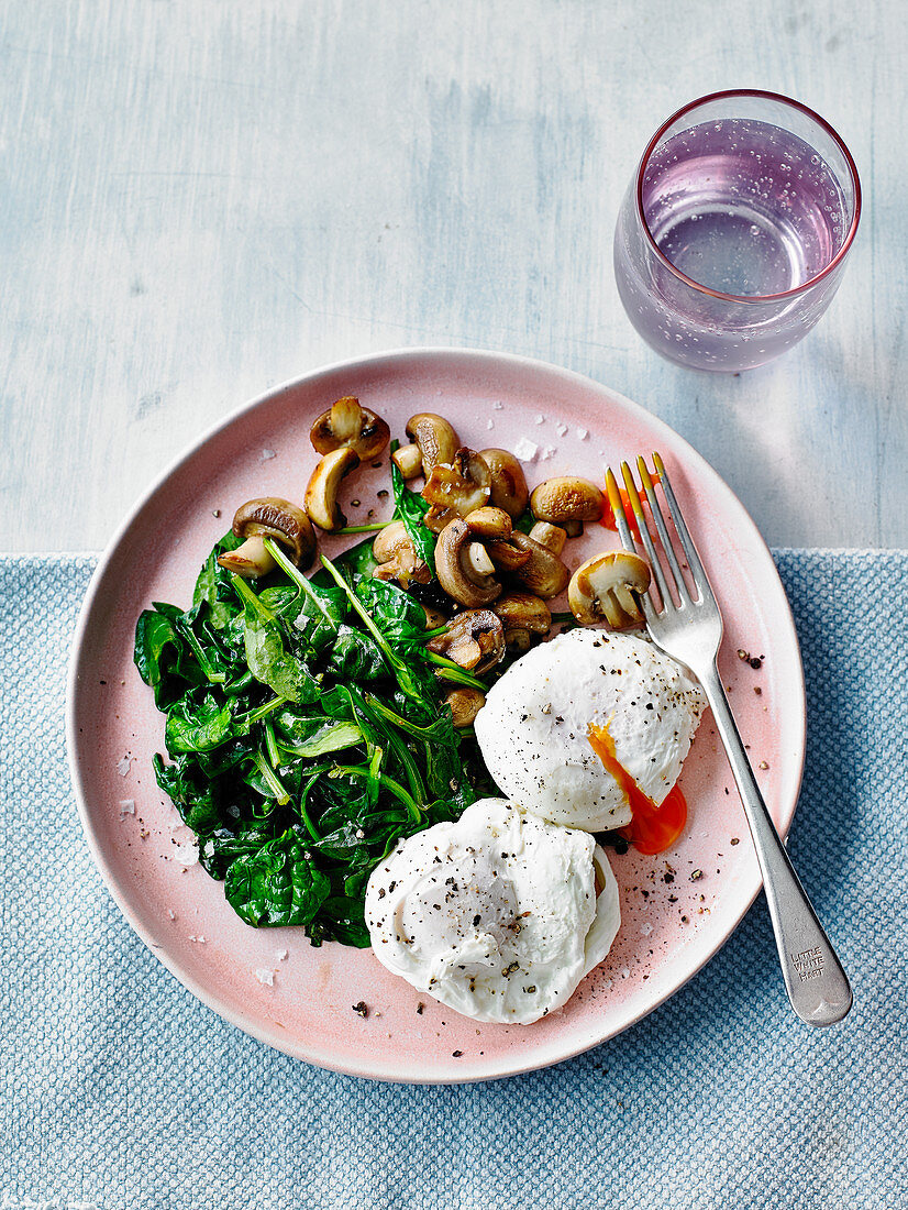 Poached eggs with mushrooms and spinach