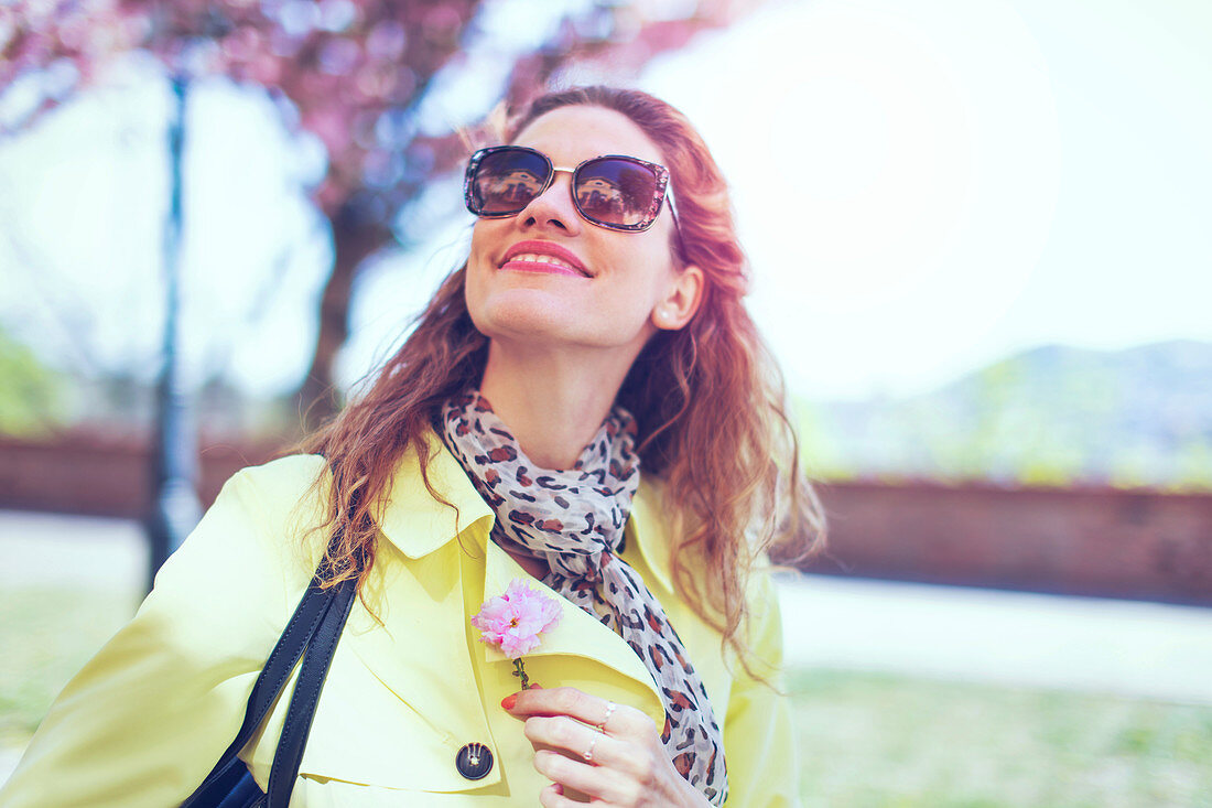 Young woman walking in park