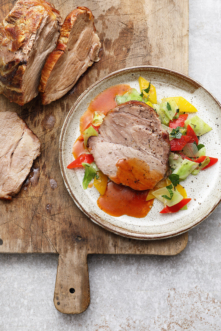 Austrian roast must pork with a pepper and white cabbage salad