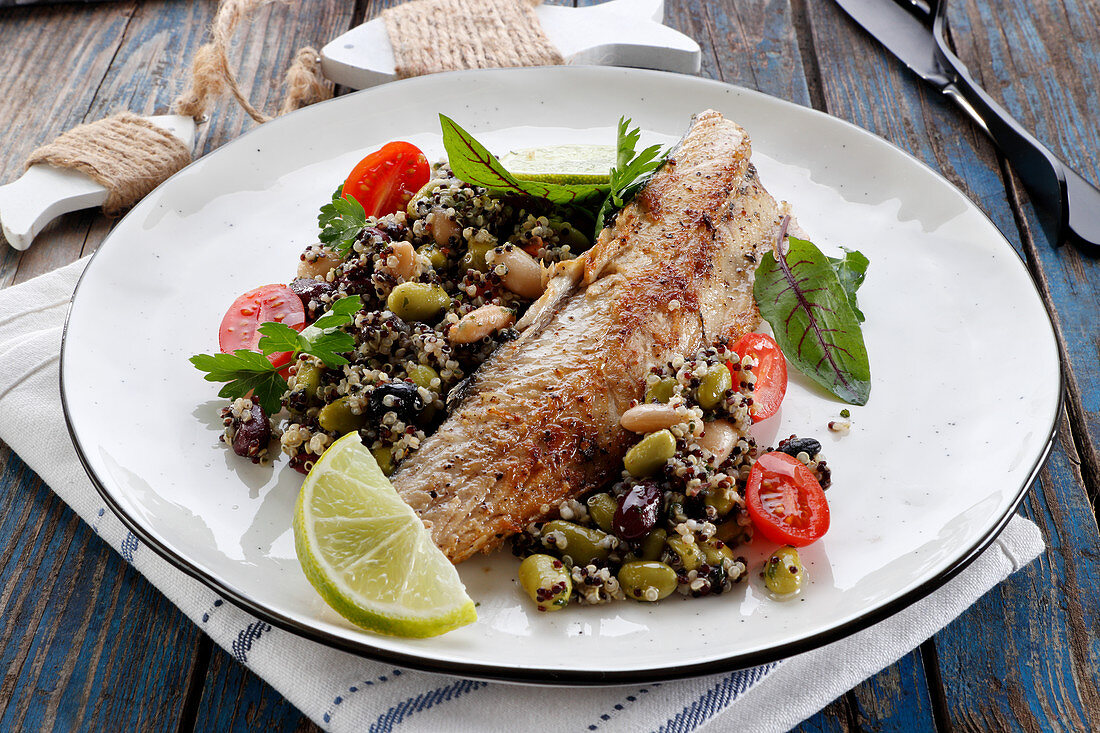 Fried mackerel with quinoa and beans