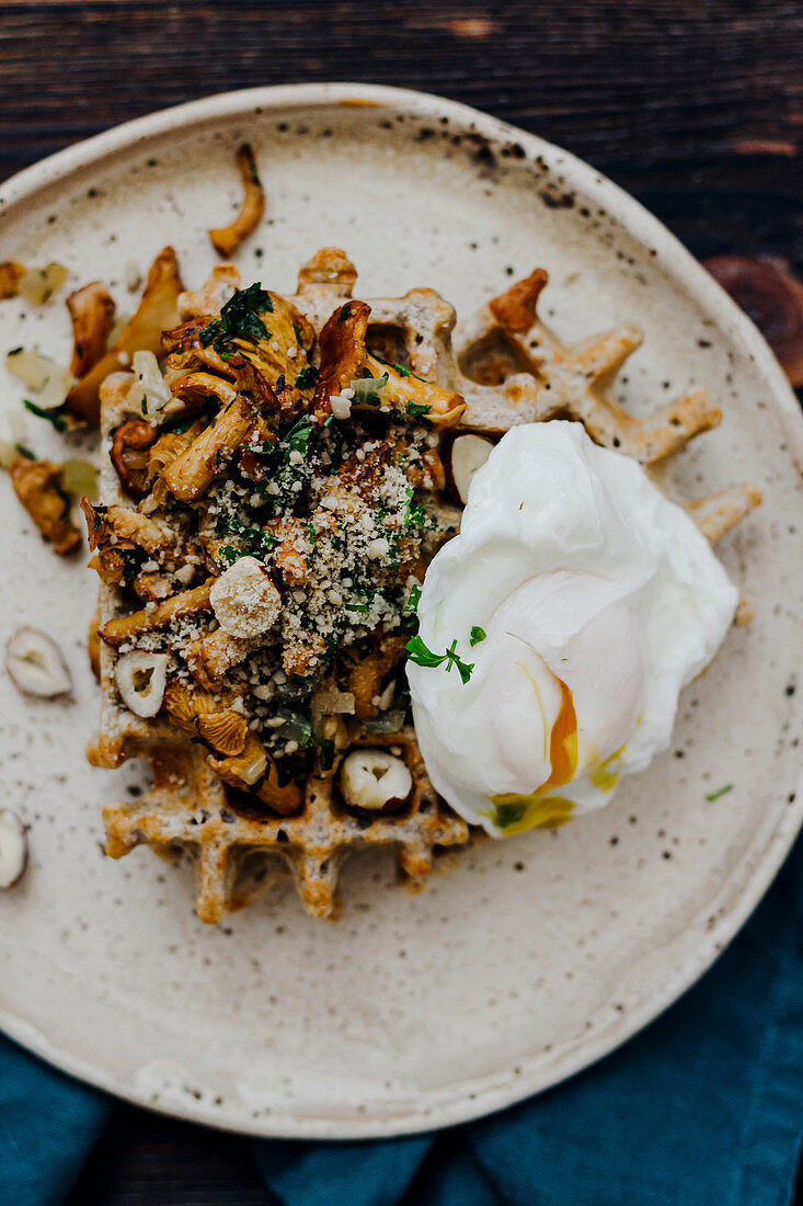 Waffles with poached egg and chanterelles