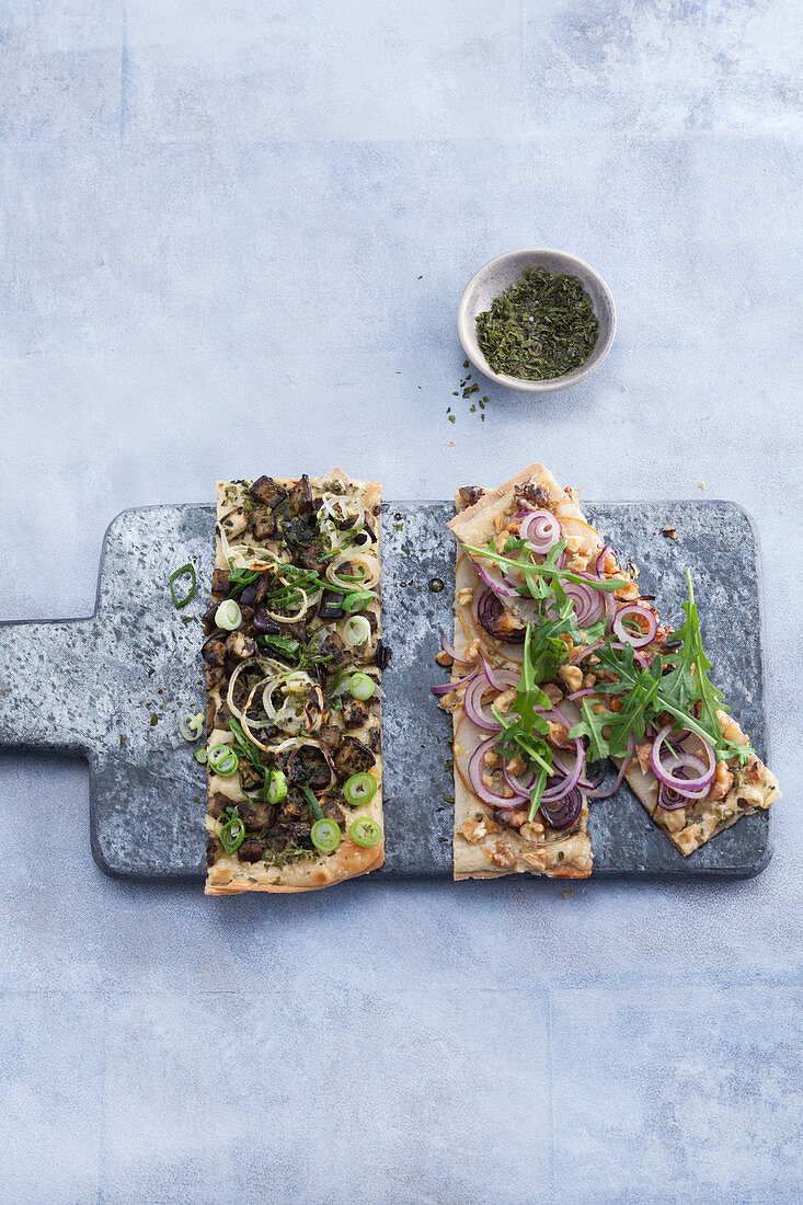 Tarte flambée – one with aubergines and dulse and one with pears and walnuts