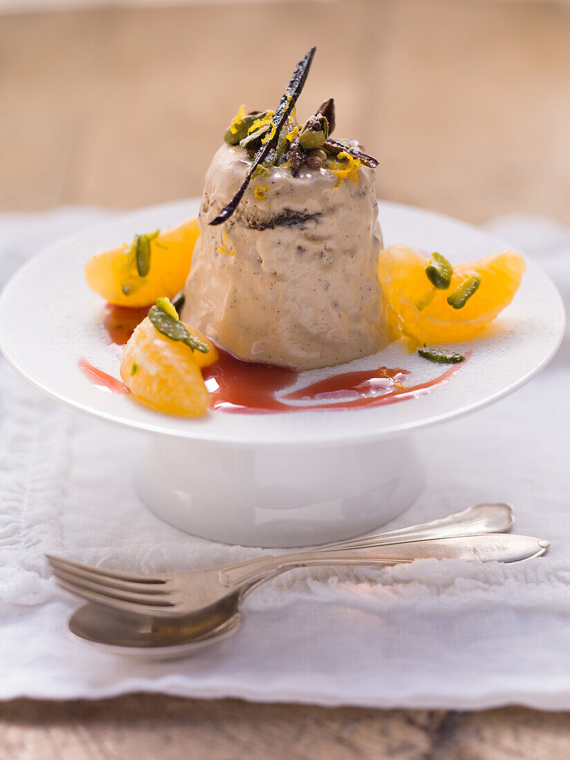 Plum parfait with punch sauce and mandarins