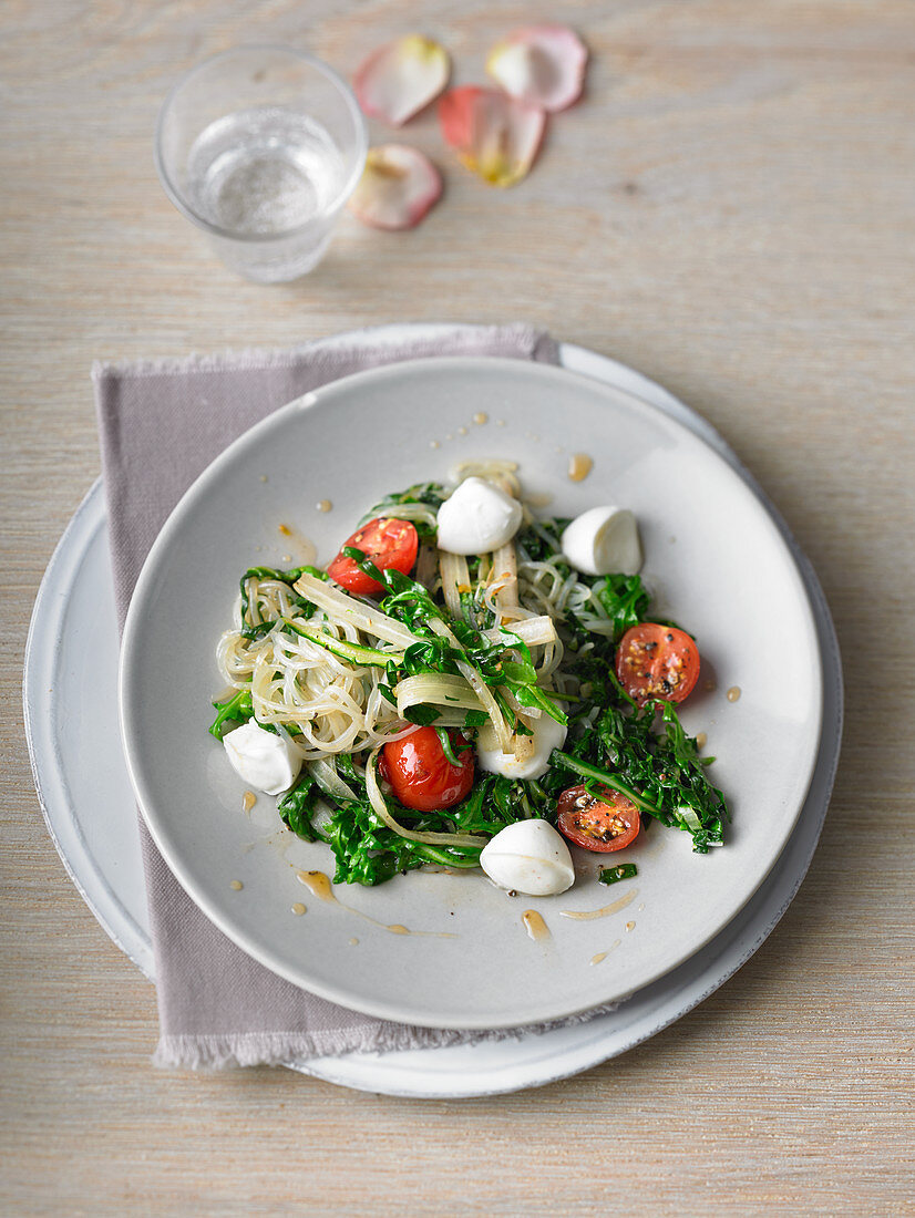 Chard and rocket vegetables on konjac pasta with tomatoes and mozzarella