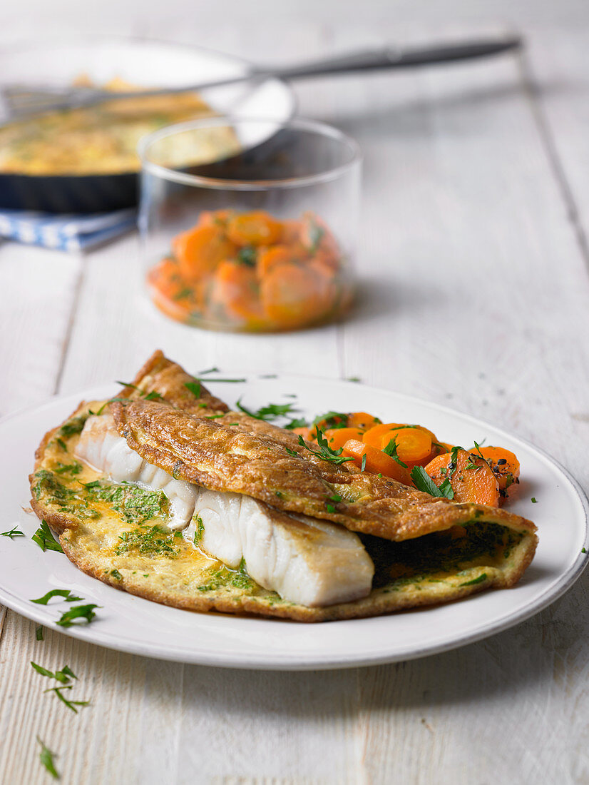 Rose fish omelette with a carrot medley
