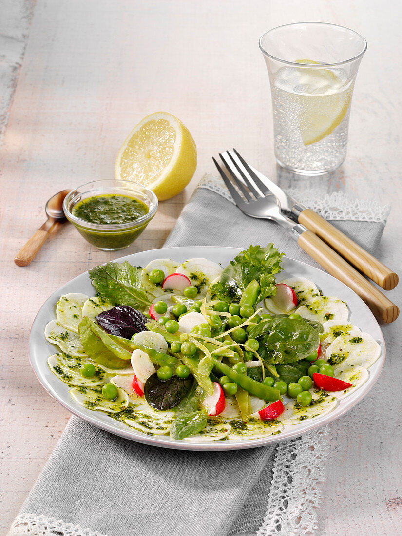 Parsley root salad with radishes and peas