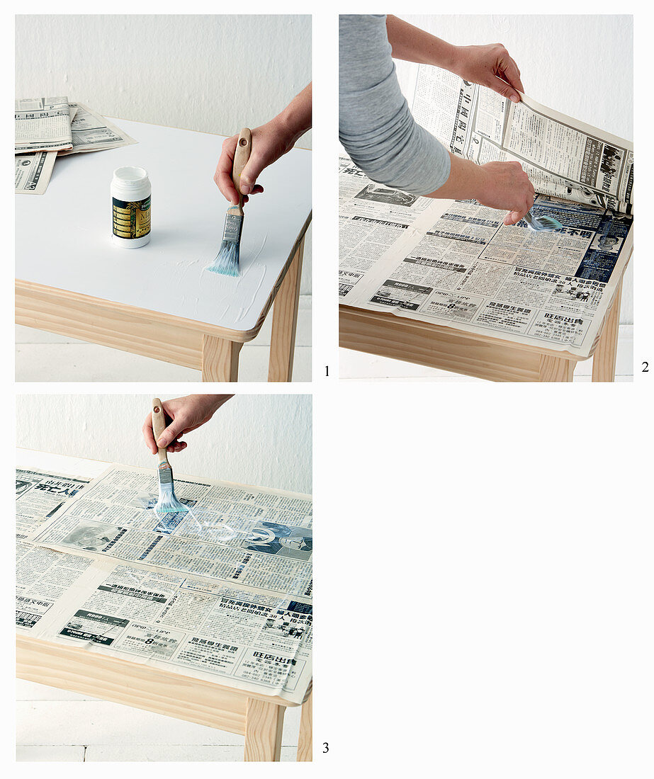 Oberfläche eines Holztisches dekorativ mit Zeitungspapier bekleben