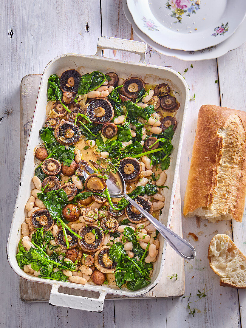 Baked mushrooms with spinach and white beans