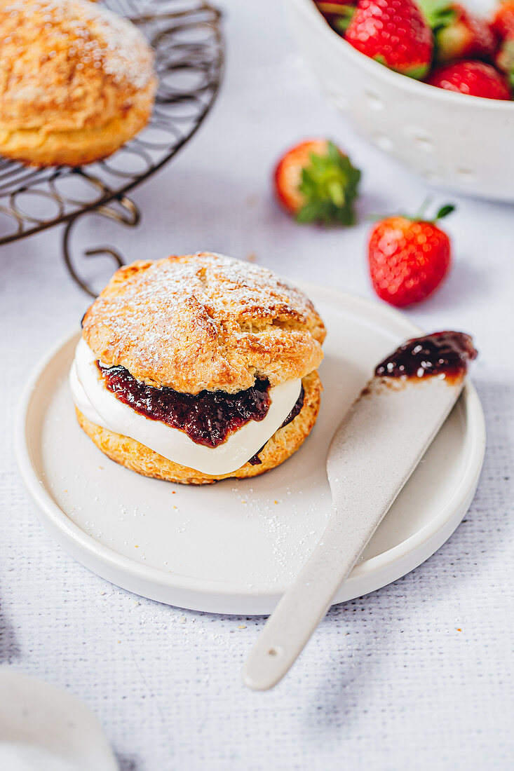 Classic scones with cream and strawberry jam