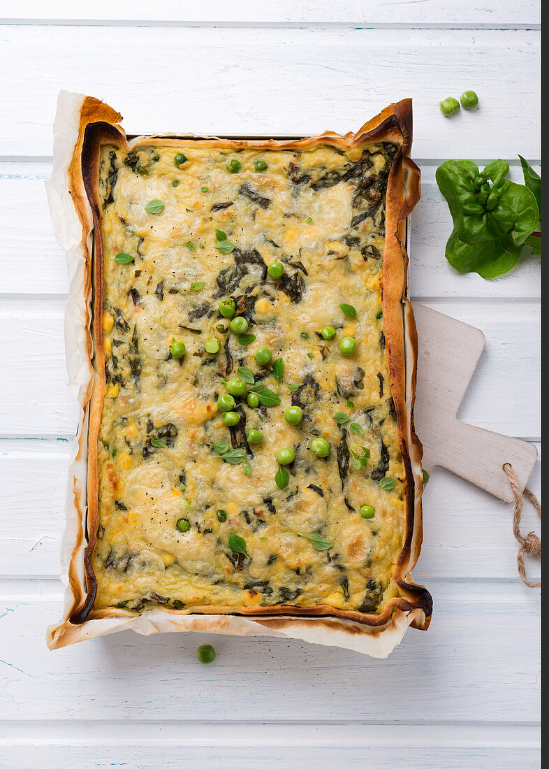 Vegan potato quiche with chard and peas