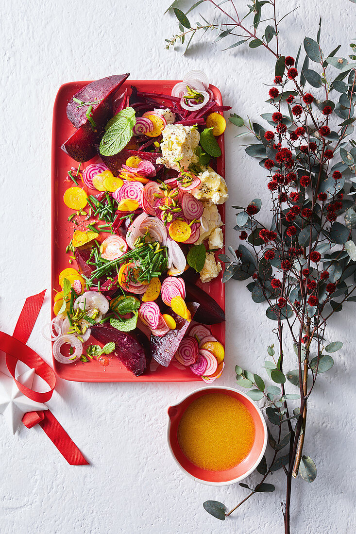 Colorful beetroot salad with feta and ruby ??grapefruit dressing for Christmas