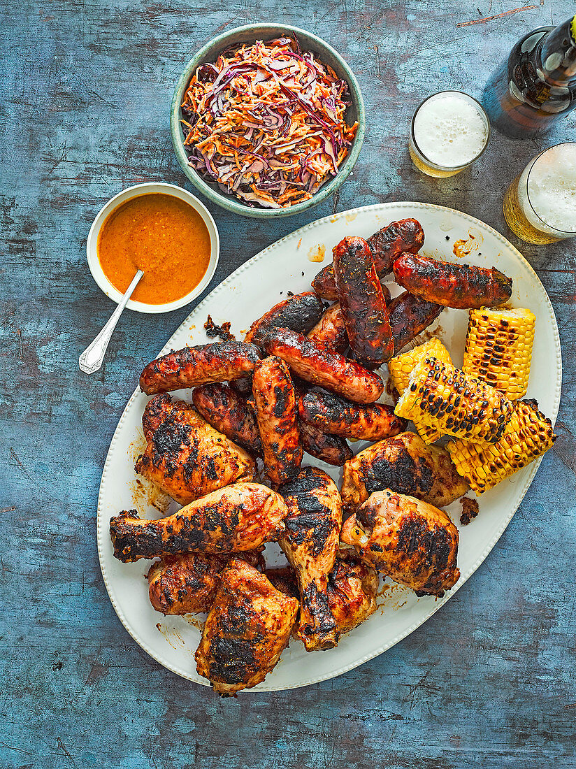 Barbecued chicken and sausages with a Carolina mustard BBQ sauce
