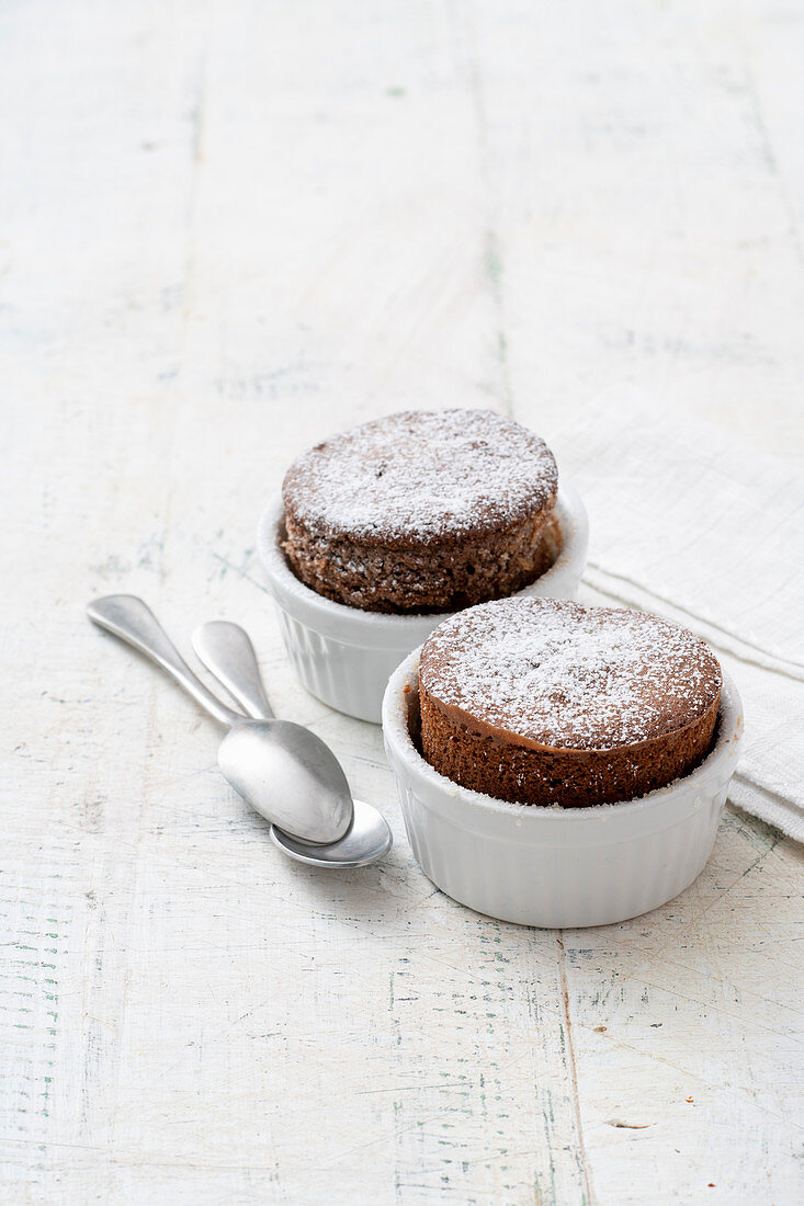 Chocolate soufflé dusted with icing sugar