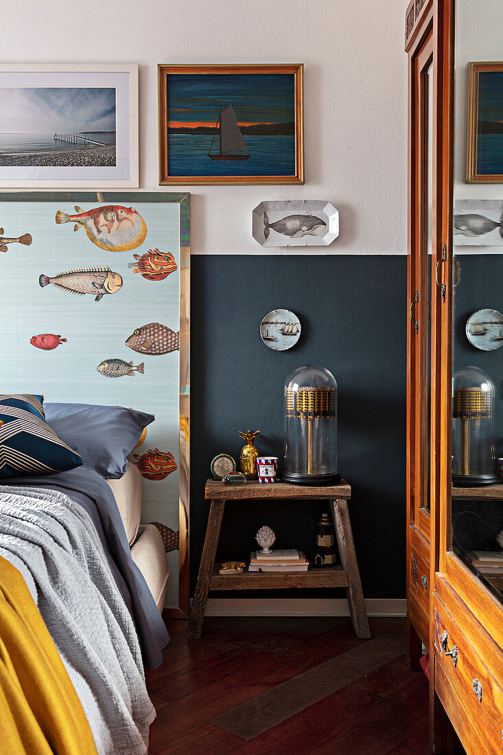 Maritime decor in bedroom with blue painted dado