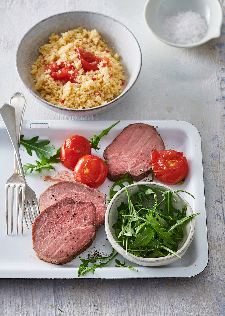 Sirloin with couscous and roasted tomatoes