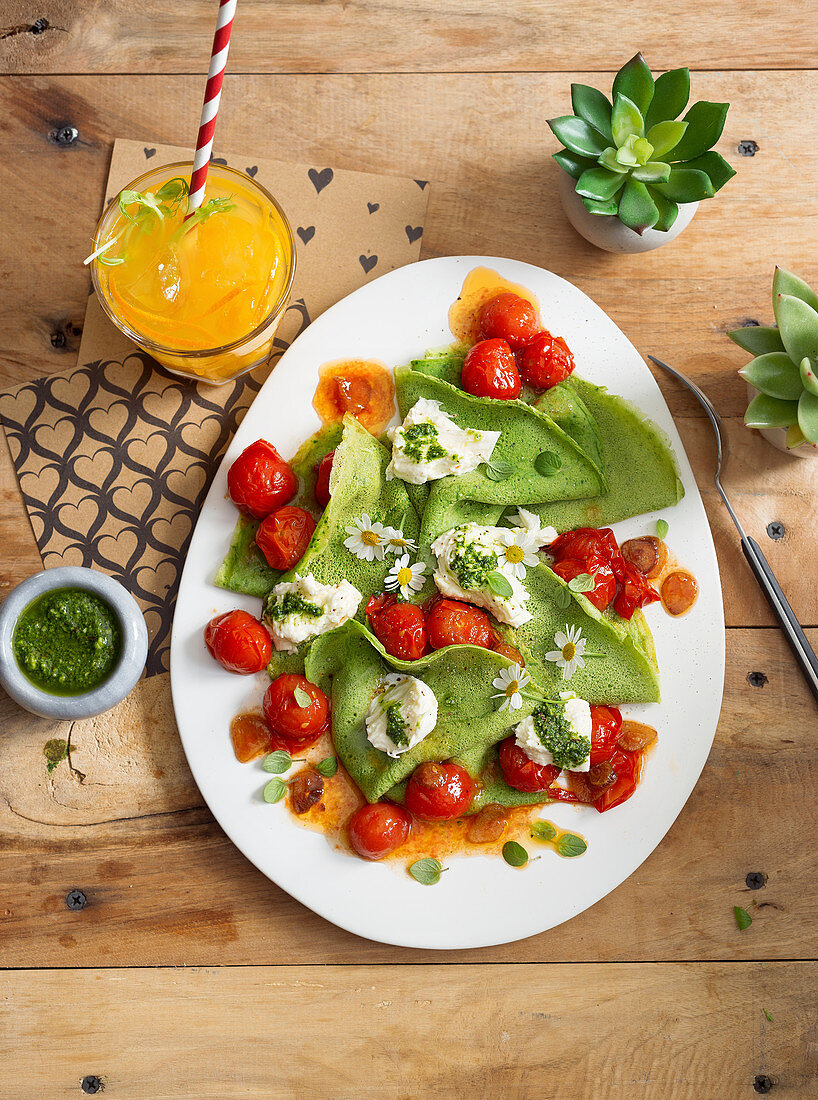 Basil pancakes with cherry tomatoes