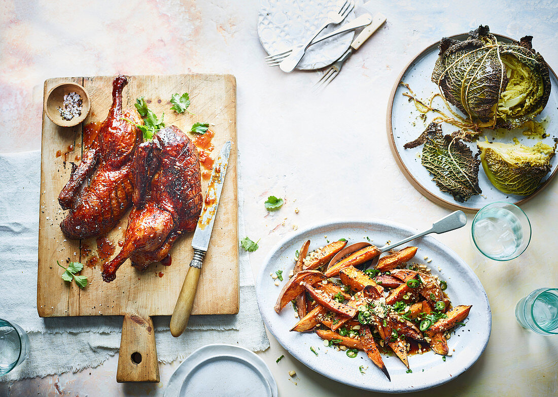 Cider can soy-glazed duck, butter-basted BBQ cabbage, sesame sweet potatoes