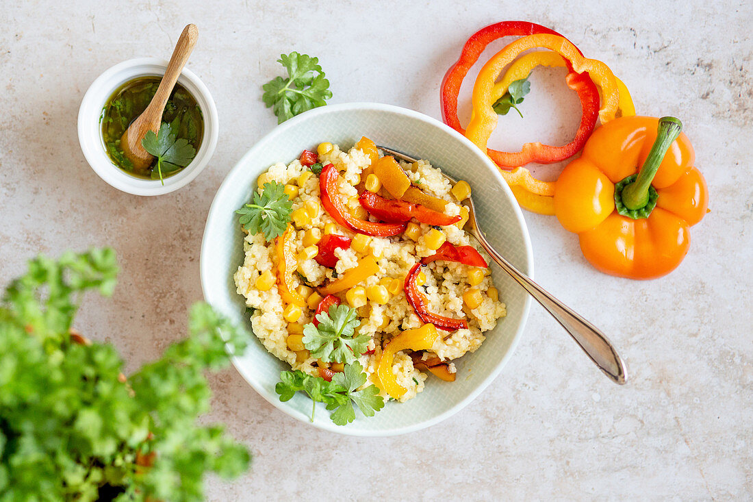 Millet bowl with peppers and sweetcorn