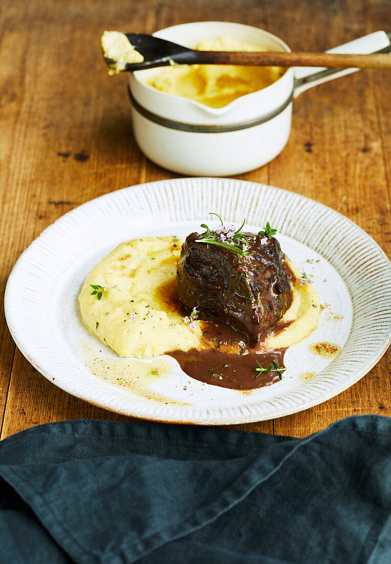 Venison cheek in a red wine sauce with mashed potatoes