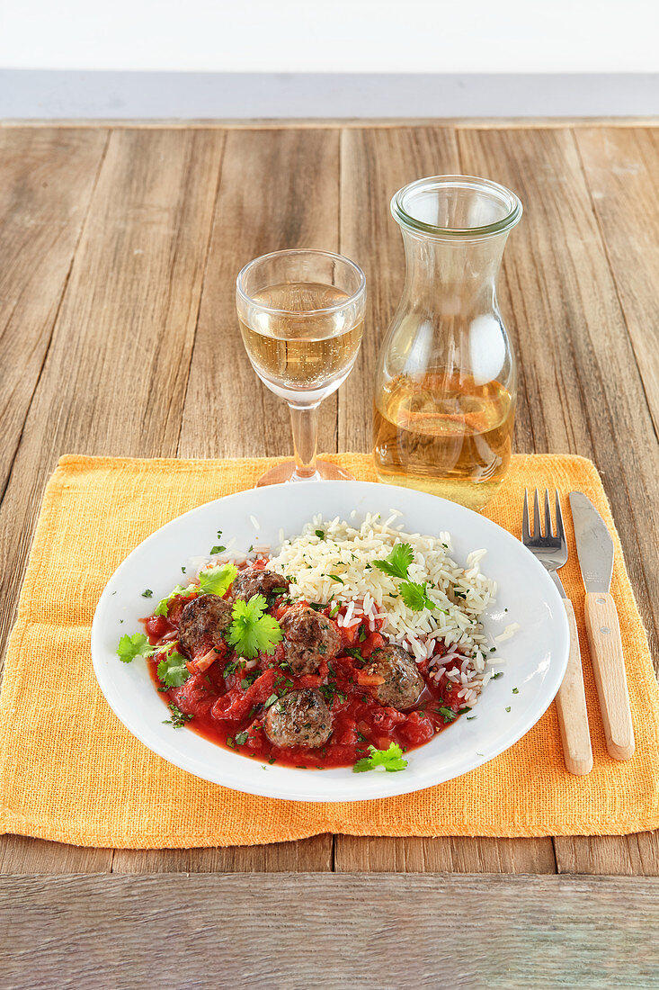 Meatballs with tomato sauce and rice
