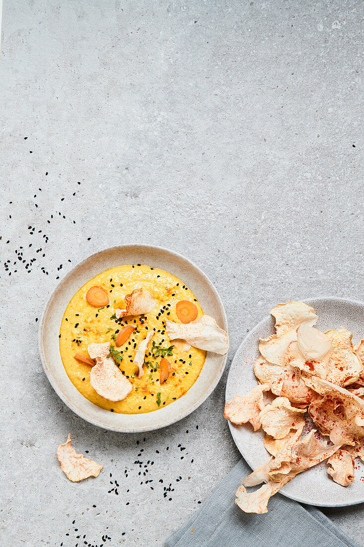 Carrot and turmeric hummus with kohlrabi chips