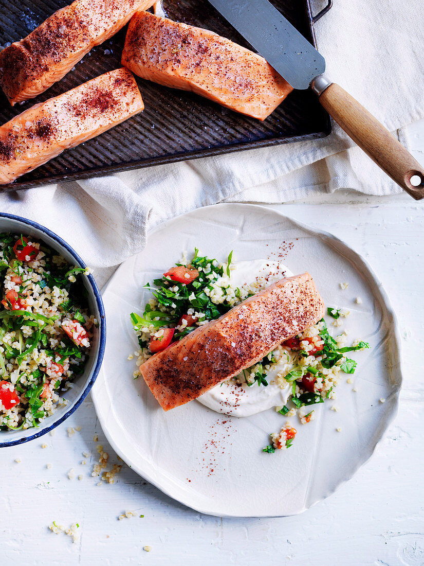 Baked salmon fillets with tahini sauce and tabbouleh